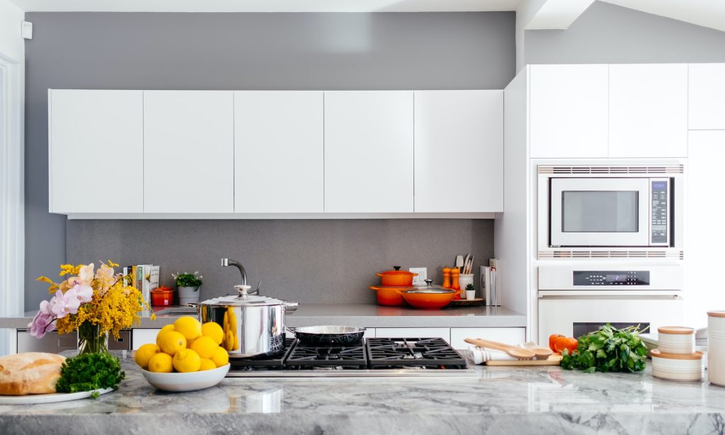 Gray Kitchen with vegetables on the table