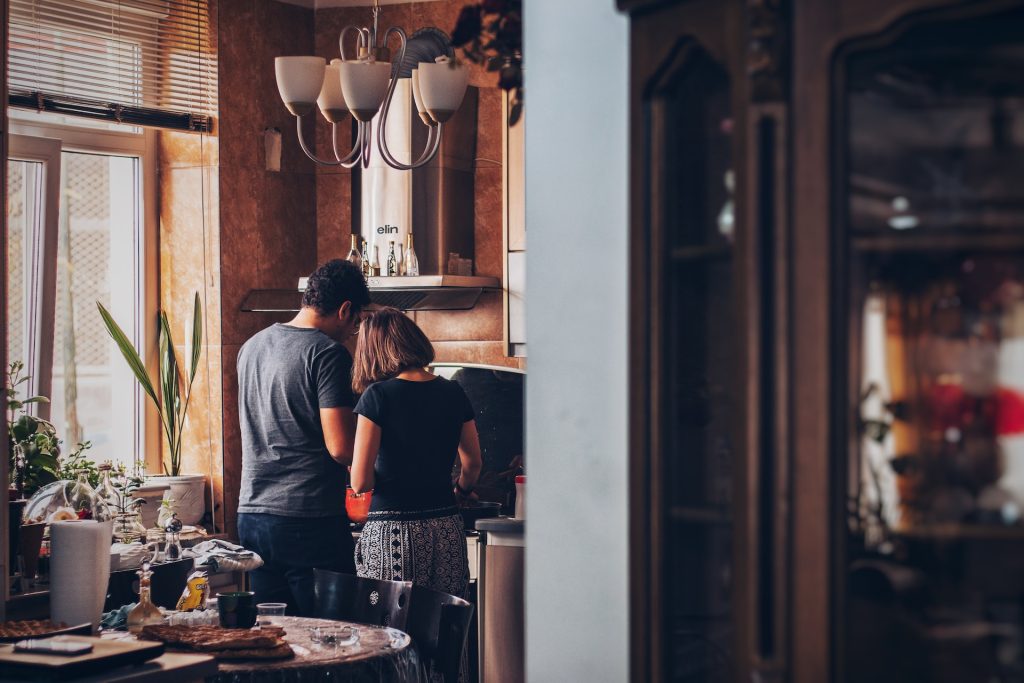 Man And Woman At The Kitchen